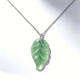 EAQUISITE GREEN DONGLING PENDANT NCK/RHOD