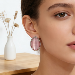 Pink cat's eye stud EAR