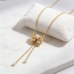 Bowknot pearl drop NCK/GOLD