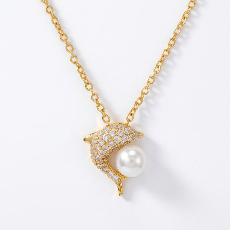 Dolphin Playing with freshwater pearl NCK/GLD