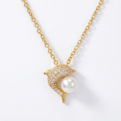 Dolphin Playing with freshwater pearl NCK/GLD